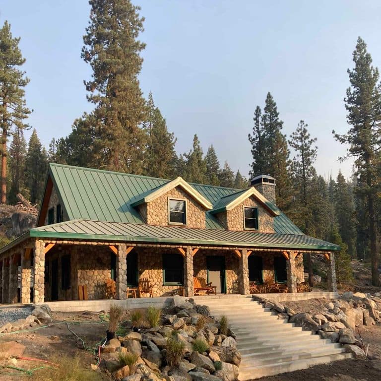 Application image for Boston Blend Granite Veneer - Rounds. The image shows this product being used in a full bed veneer application. The surface finish shown is . The dominant color shown is brown. The color mix creates a warm feeling.