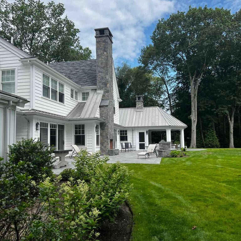 Application image for Vineyard Granite Veneer - Square and Rectangle. The image shows this product being used in a full bed veneer application. The surface finish shown is . The dominant color shown is gray. The color mix creates a cool feeling.
