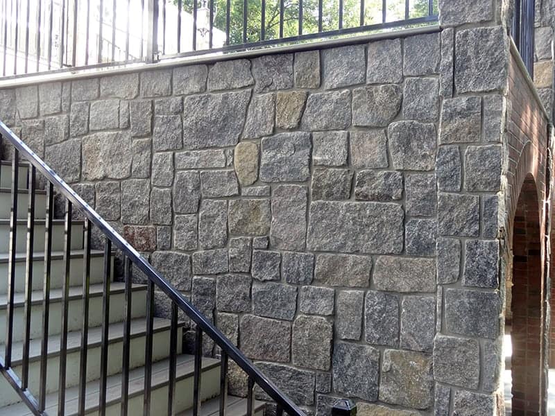 Application image for Vineyard Granite Veneer - Square and Rectangle. The image shows this product being used in a full bed veneer application. The surface finish shown is . The dominant color shown is gray. The color mix creates a cool feeling.