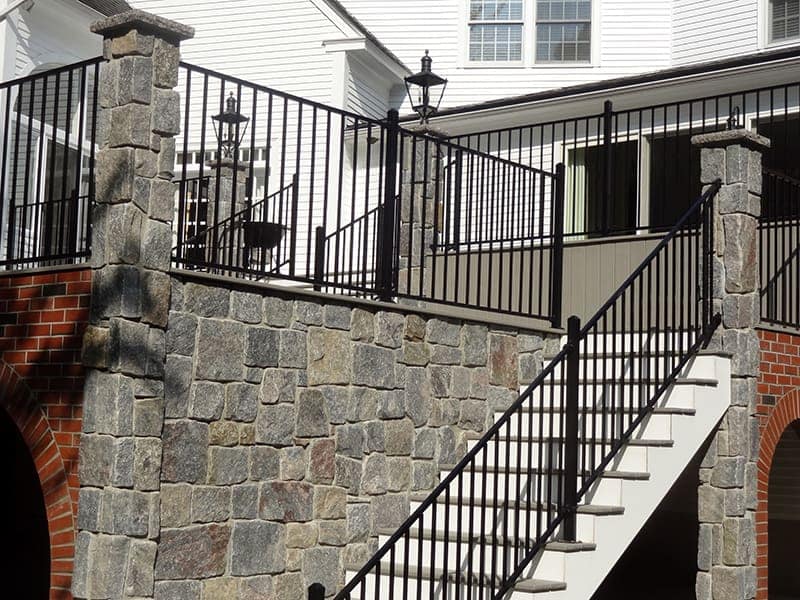 Application image for Vineyard Granite Veneer - Square and Rectangle. The image shows this product being used in a full bed veneer application. The surface finish shown is . The dominant color shown is gray. The color mix creates a warm feeling.