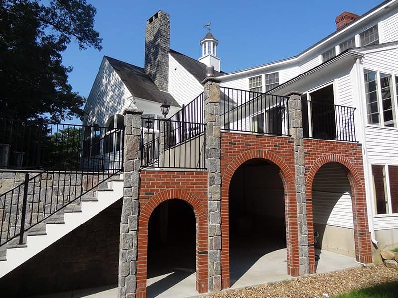 Application image for Vineyard Granite Veneer - Square and Rectangle. The image shows this product being used in a full bed veneer application. The surface finish shown is . The dominant color shown is gray. The color mix creates a warm feeling.