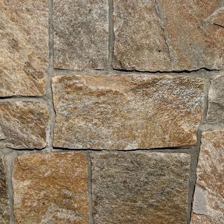 Color/Finish variation image for New England Tan Granite Veneer - Square and Rectangle. The surface finish shown is . Dominant colors shown are brown, gray and tan. The color mix creates a warm feeling.