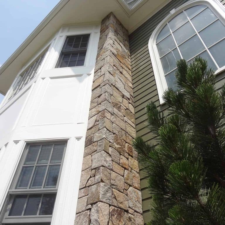 Application image for New England Tan Granite Veneer - Square and Rectangle. The image shows this product being used in a thin veneer application. The surface finish shown is . Dominant colors shown are brown and tan. The color mix creates a warm feeling.