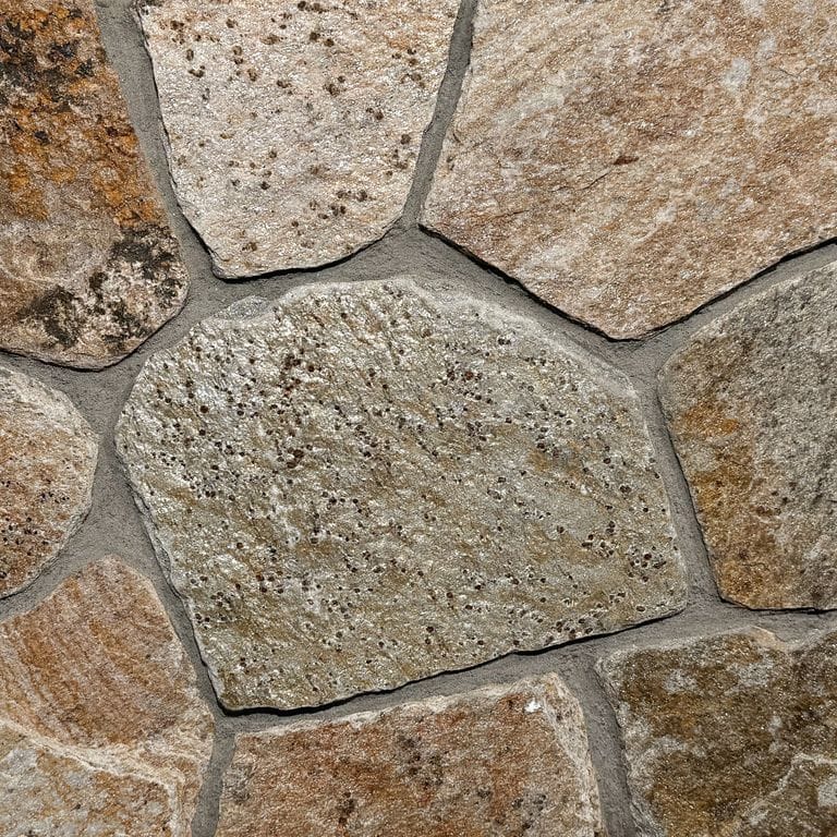 Color/Finish variation image for New England Tan Granite Veneer - Mosaic. The surface finish shown is . Dominant colors shown are brown, gray and tan. The color mix creates a warm feeling.