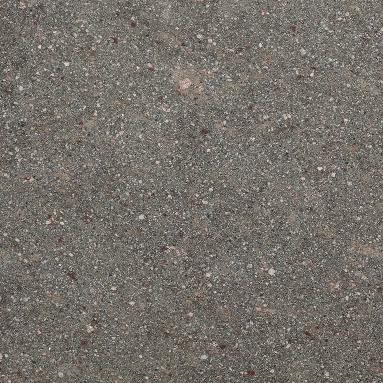 Swatch image for Imperial Gray Porphyry - Cobblestones. The surface finish shown is split-face. The dominant color shown is gray. The color mix creates a warm feeling.