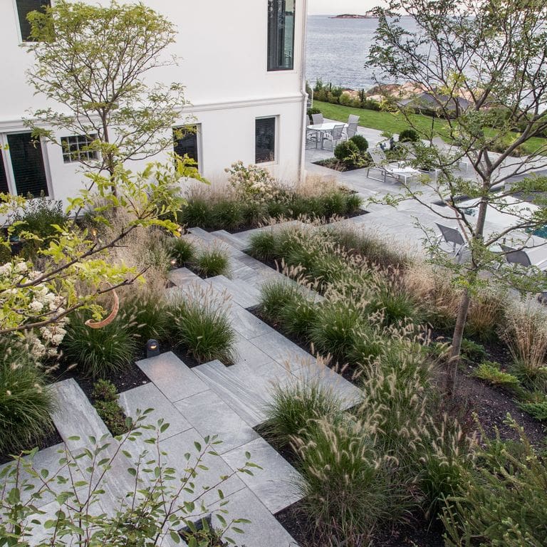 The image shows this product being used in a path pavers application.