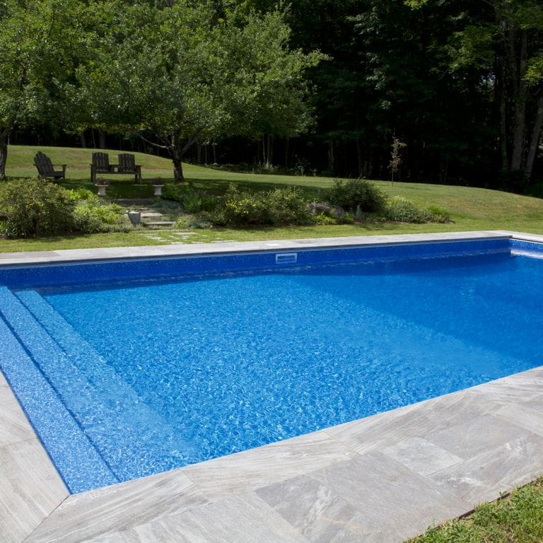 The image shows this product being used for Granite - Mystic Mountain- Dimensional Cut Pavers.