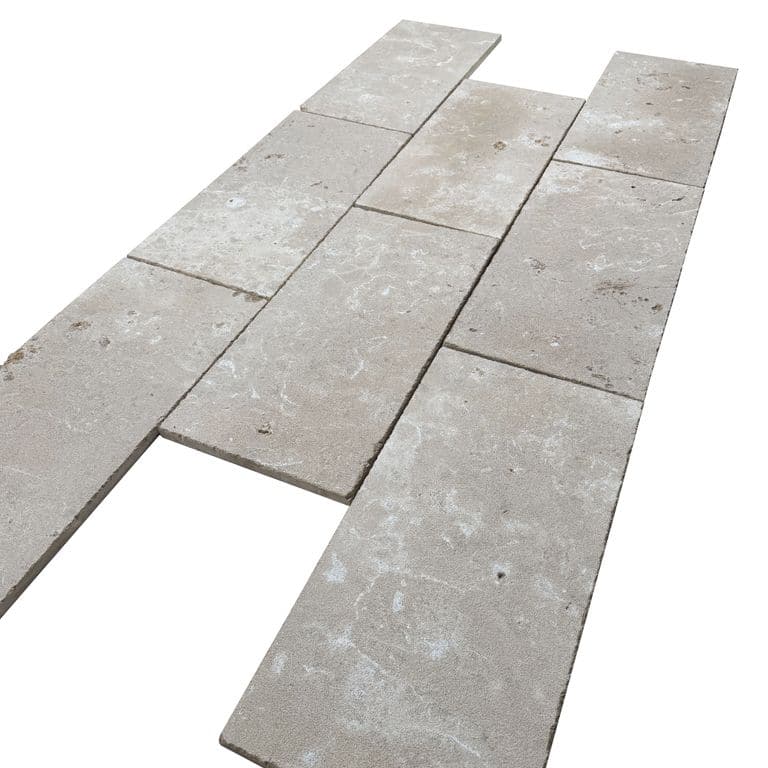 Color/Finish variation image for COPY - Bavarian Dolomite Gray Limestone - Pavers. The surface finish shown is bush hammered. Dominant colors shown are gray and tan.