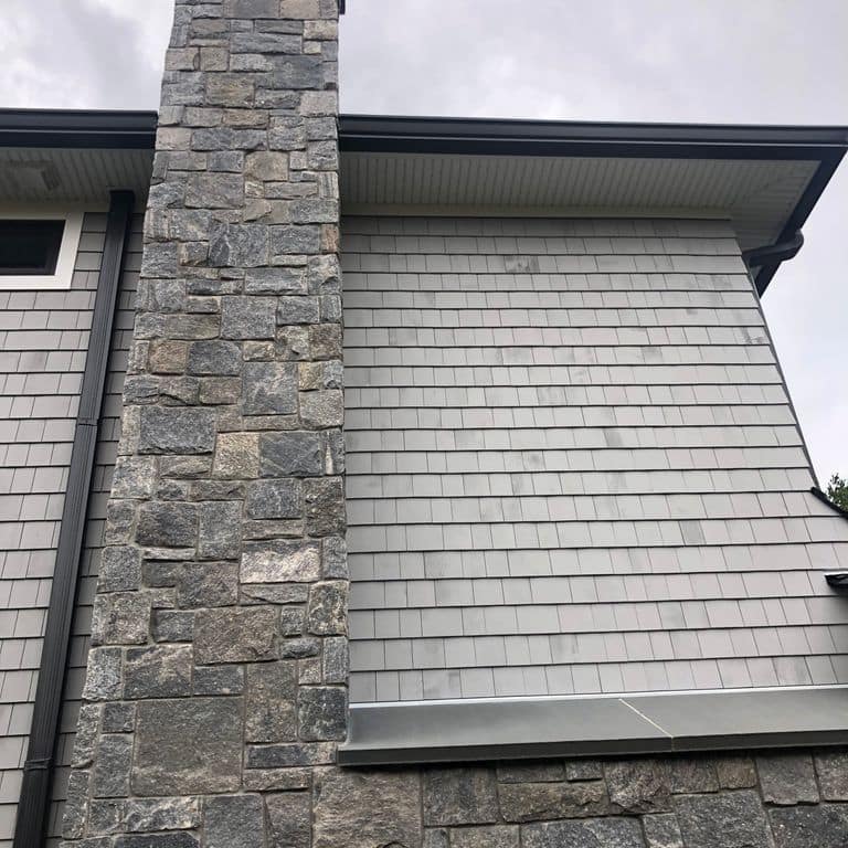 Application image for Test Record - Libery Hill Granite - Veneer. The image shows this product being used in a thin veneer application. The dominant color shown is gray. The color mix creates a cool feeling.