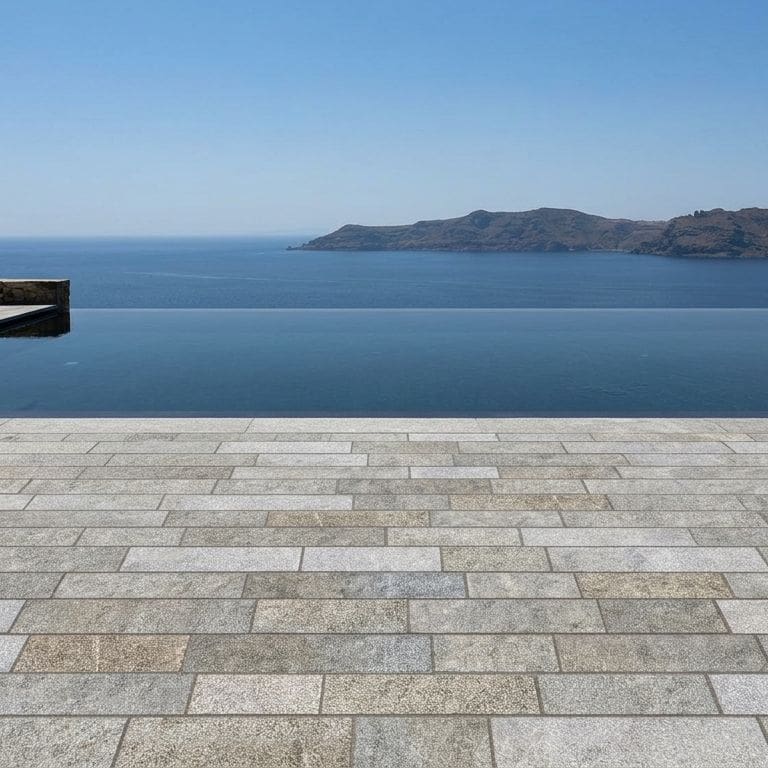 Application image for Heritage Plank Granite - Buff - Plank Pavers. The image shows this product being used for patio pavers and pool deck pavers. The surface finish shown is split-face. Dominant colors shown are gray and greige. The color mix creates a warm feeling.
