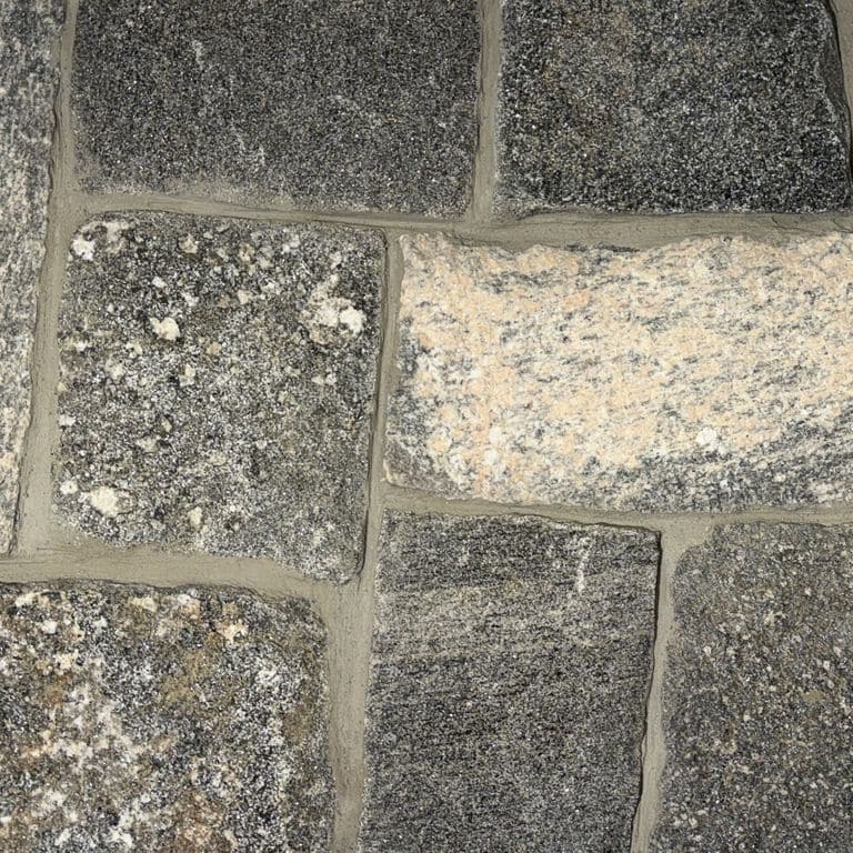 Best close-up image for Mystic Harbor Granite -Square and Rectangle. The surface finish shown is . The dominant color shown is gray. The color mix creates a warm feeling.