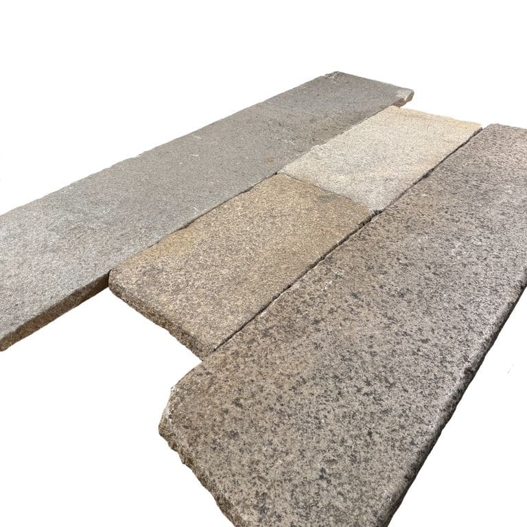 Color/Finish variation image for Reclaimed Footworn Granite - Plank Pavers. The surface finish shown is . The dominant color shown is gray. The color mix creates a warm feeling.