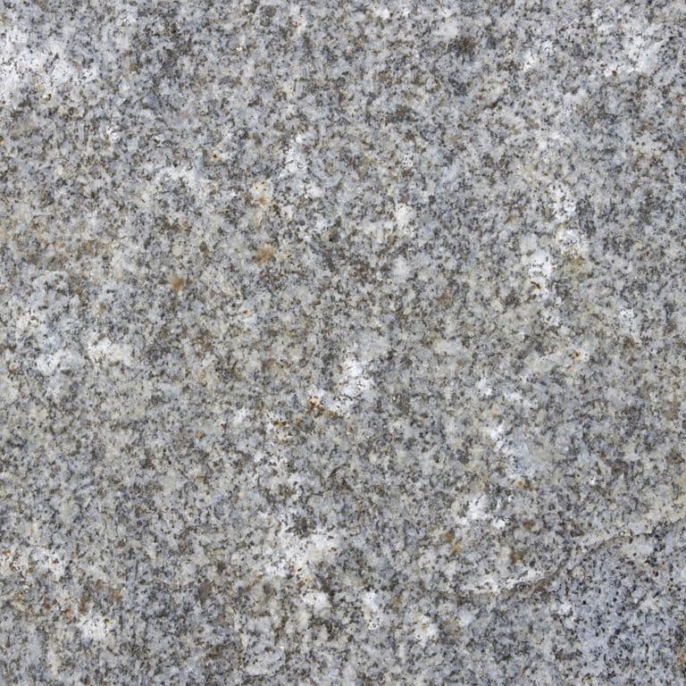 Color/Finish variation image for Reclaimed First Generation Granite Curbstone Steps - Textured Riser and Tread. The dominant color shown is gray; with beige, blue, brown, green, purple and white secondaries. The color mix creates a cool feeling. Speckled, fine speckled, swirled and cloudy color patterns. Contains mineral inclusions.