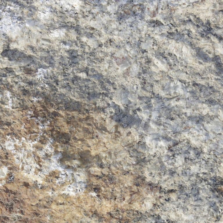 Color/Finish variation image for Reclaimed First Generation Granite Curbstone Steps - Textured Riser and Tread. The dominant color shown is gray; with beige, brown, green, orange/rust, purple, white, tan and cream secondaries. Exhibits "movement" and the color mix creates a warm feeling. Random, speckled, blotched, swirled and cloudy color patterns. Contains mineral inclusions.