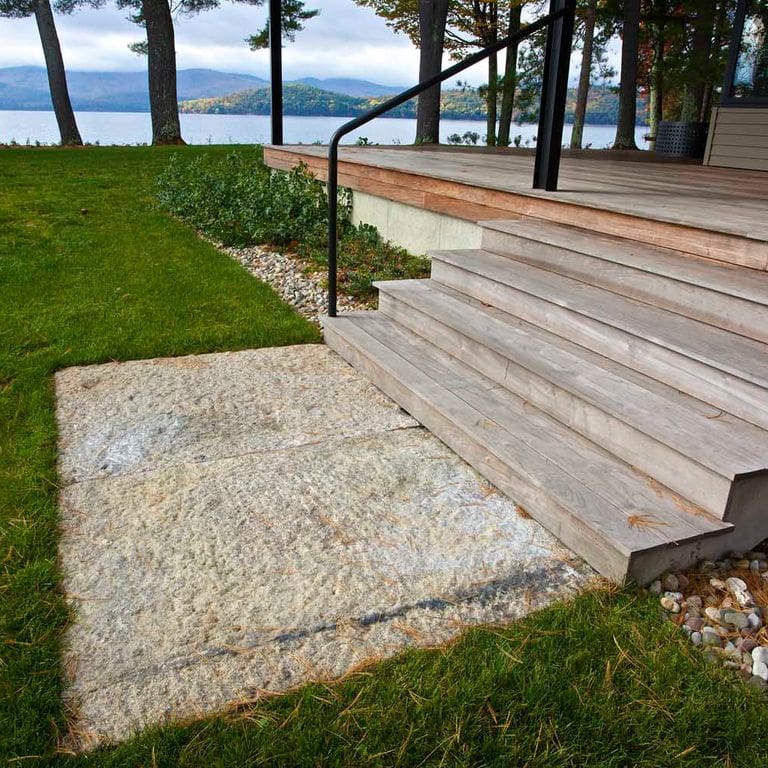 Application image for Reclaimed Granite Landings. The image shows this product being used in a landings application. This is a landscape stone for outdoor commercial and residential applications. Suitable for general use, freeze-thaw conditions, low heat absorption surfaces, high traffic areas, low slipperiness surfaces and high heel compatibilty situations. Higher to high on the price spectrum.