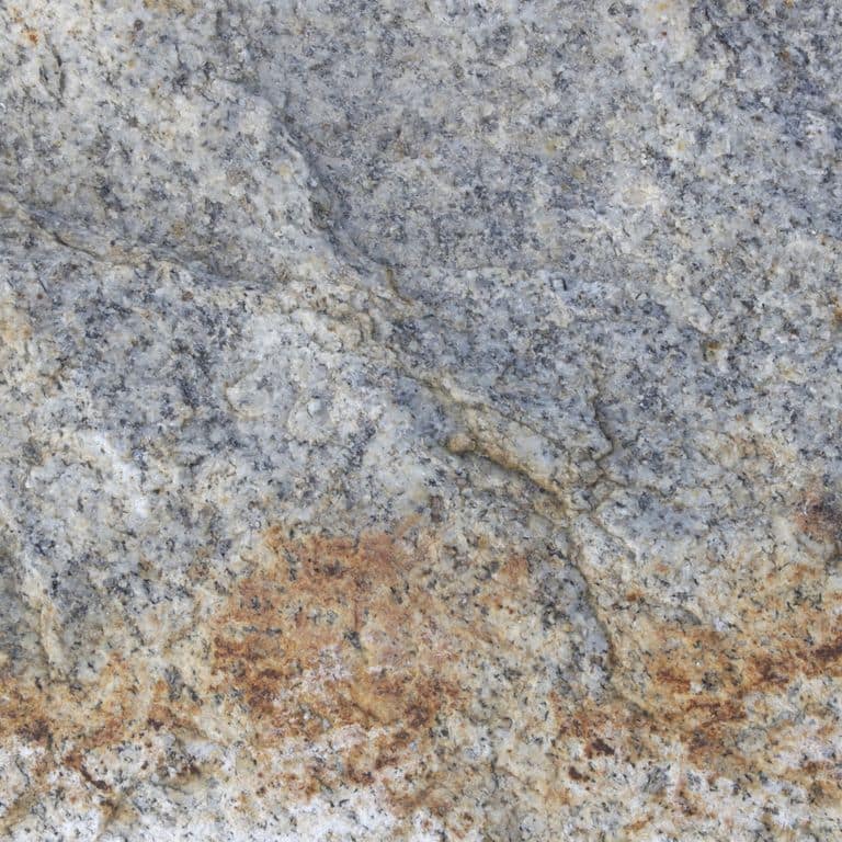 Color/Finish variation image for Reclaimed Granite Curbstone - Pool Coping. The dominant color shown is gray; with beige, blue, brown, orange/rust, white and tan secondaries. Exhibits "movement" and the color mix creates a warm feeling. Random, speckled, blotched and veined color patterns. Contains some mica and mineral inclusions.