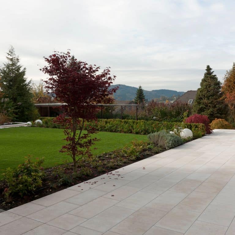 The image shows this product being used in a path pavers application.