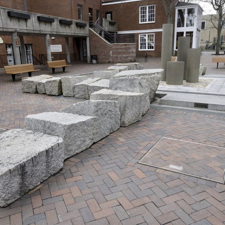 Application image for Granite - Reclaimed Block - Benches. The image shows this product being used in a seating &amp; benches application. This is a landscape stone for outdoor commercial and residential applications. Suitable for general use, freeze-thaw conditions, low heat absorption surfaces and low slipperiness surfaces situations. Relatively higher in price.