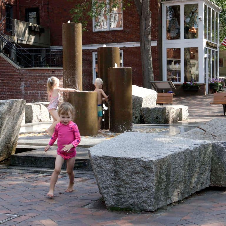 Application image for Granite - Reclaimed Block - Benches. The image shows this product being used in a seating &amp; benches application. This is a landscape stone for outdoor commercial and residential applications. Suitable for general use, freeze-thaw conditions, low heat absorption surfaces and low slipperiness surfaces situations. Relatively higher in price.