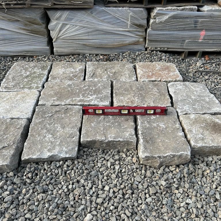 Application image for Granite - Reclaimed New England Cobblestones - Super Jumbo Pavers. The dominant color shown is gray. The color mix creates a warm feeling.