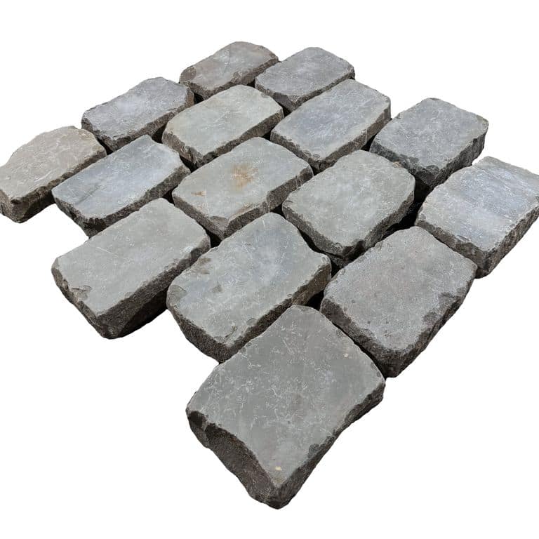 Application image for Reclaimed European Sandstone Cobblestones - Rectangle - Flat Surface. The surface finish shown is sawn. Dominant colors shown are gray and tan.