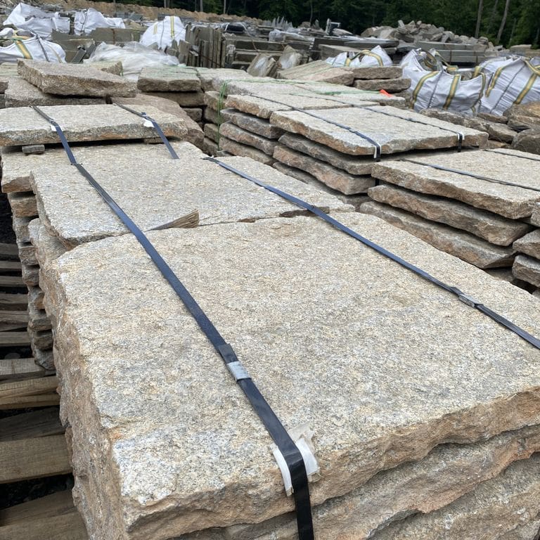 Application image for Granite - Reclaimed Pavers - Squares. The surface finish shown is . The dominant color shown is gray. The color mix creates a cool feeling.