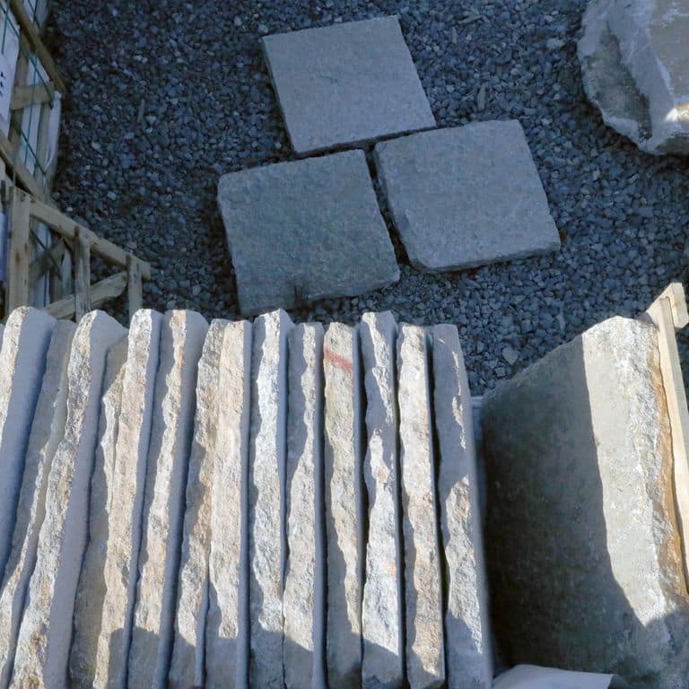 Application image for Granite - Reclaimed Pavers - Squares. The surface finish shown is . The dominant color shown is gray. The color mix creates a cool feeling.