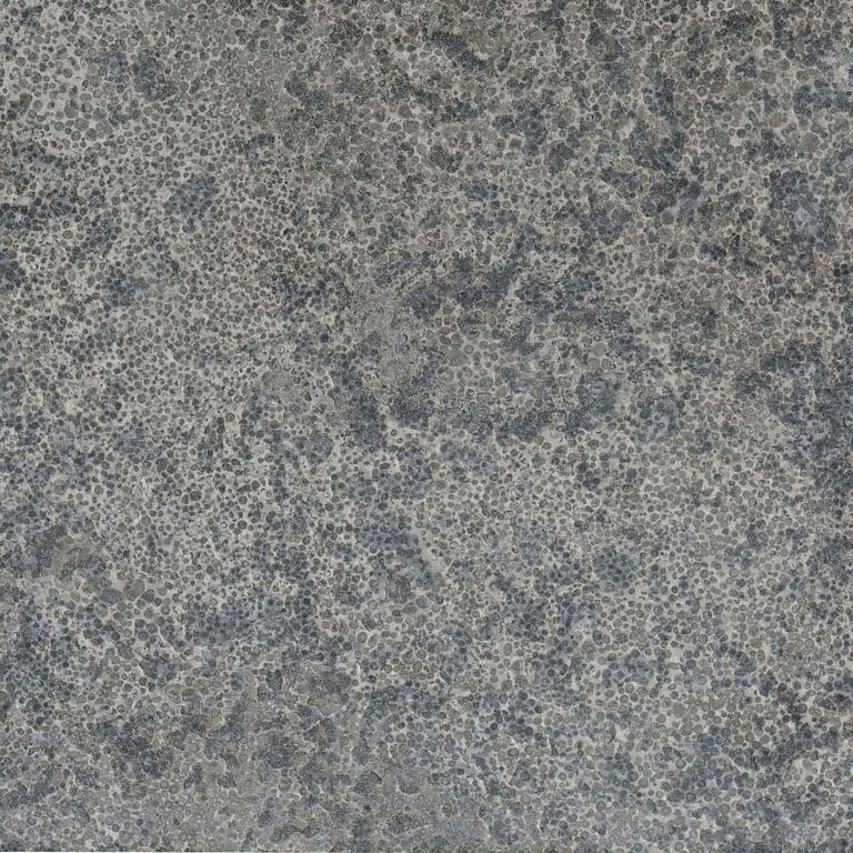 Swatch image cropped for Highland Limestone Dimensional Cut Pavers. The surface finishes shown are brushed and flamed. Dominant colors shown are green and gray; with brown and purple secondaries. Exhibits "movement" and the color mix creates a cool feeling. Regular, speckled, blotched and swirled color patterns.