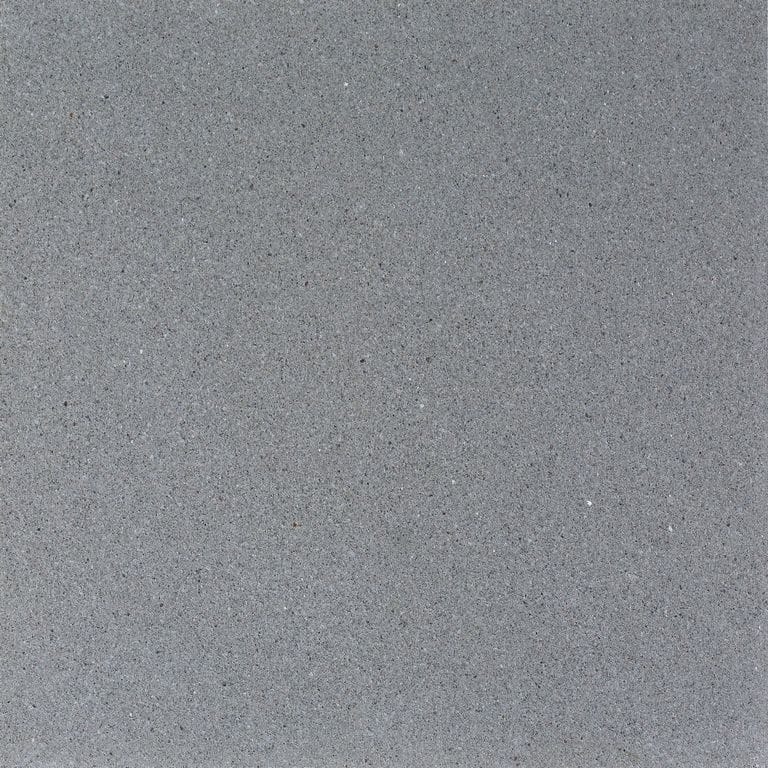 Swatch image cropped for Italian Bluestone Pavers. The surface finishes shown are brushed and bush hammered. The dominant color shown is gray; with blue and green secondaries. The color mix creates a cool feeling. Solid color pattern.