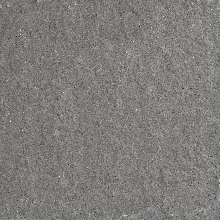 Color/Finish variation image for Italian Bluestone Pavers. The surface finishes shown are brushed and flamed. The dominant color shown is gray; with green and purple secondaries. The color mix creates a cool feeling. Regular, fine speckled and cloudy color patterns.