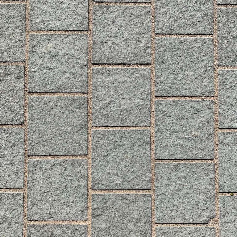Close-up image for Italian Bluestone Pavers. The surface finish shown is flamed. Dominant colors shown are green and gray. Solid, regular, fine speckled and cloudy color patterns.