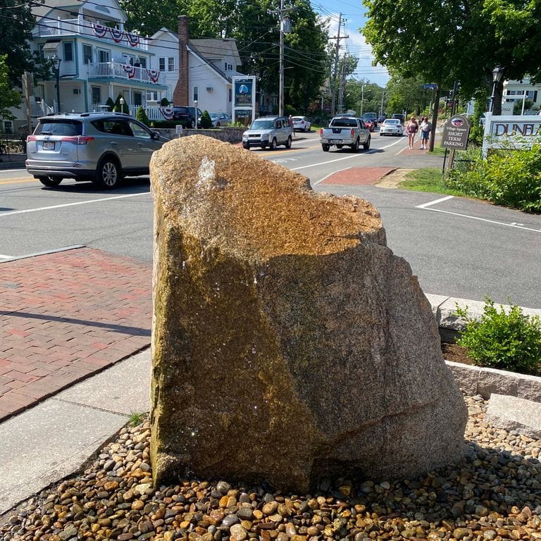 Application image for New England Fieldstone Boulders &amp; Ledgestone - Fountains &amp; Lights. The image shows this product being used for water features and landscape boulders &amp; ledge. The surface finish shown is weathered. The dominant color shown is gray.