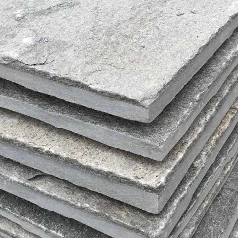 Close-up image for Greek Quartzite Slate - Grey - Veneer. The dominant color shown is gray; with beige and white secondaries. Exhibits "movement" and the color mix creates a cool feeling. Regular, speckled, fine speckled and cloudy color patterns.