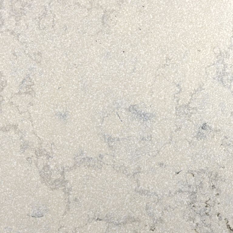 Color/Finish variation image for Sky Prima Limestone - Veneer. The surface finishes shown are brushed and sand blasted. Dominant colors shown are beige, gray, white and cream. Exhibits "movement". Random, fine speckled, swirled and cloudy color patterns.