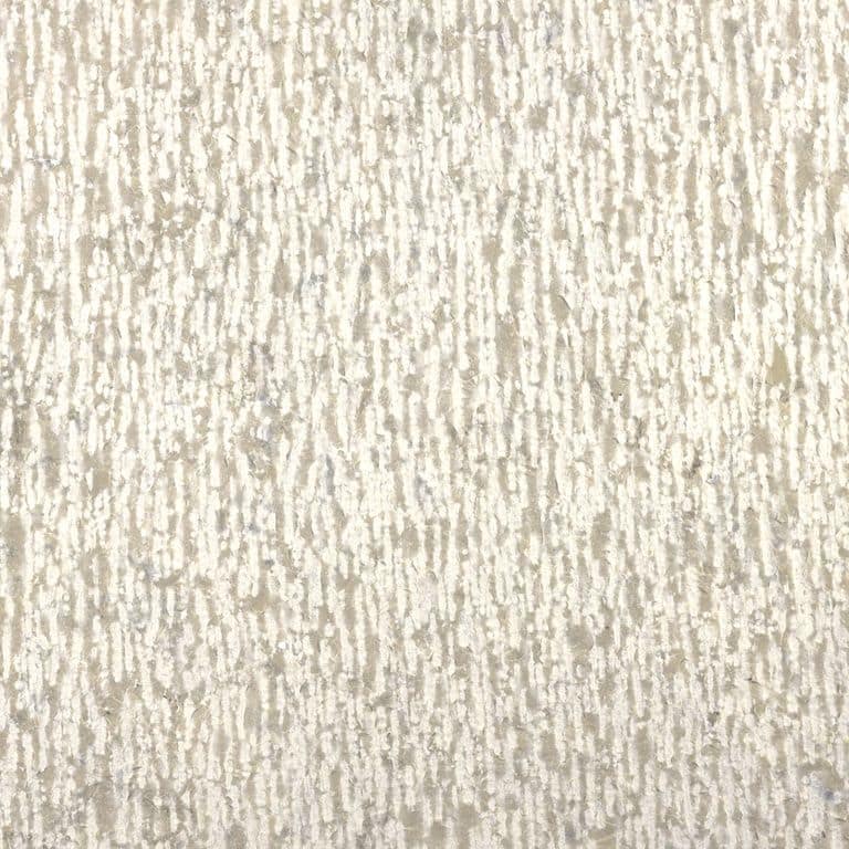 Color/Finish variation image for Sky Prima Limestone - Veneer. The surface finish shown is chiseled. Dominant colors shown are beige, white, tan and cream; with a gray secondary. The color mix creates a warm feeling. Regular and linear color patterns.