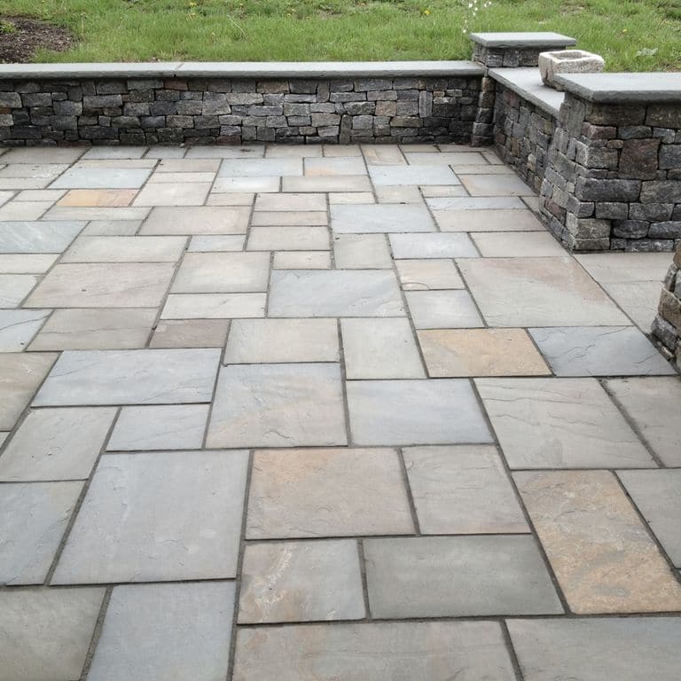 The image shows this product being used in a patio pavers application.