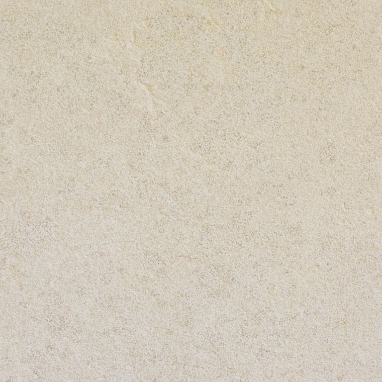 Swatch image cropped for Mountain Hard Limestone Beige - Architectural Elements. The surface finish shown is sand blasted. Dominant colors shown are beige and cream; with gray, white and tan secondaries. The color mix creates a warm feeling. Solid and fine speckled color patterns.