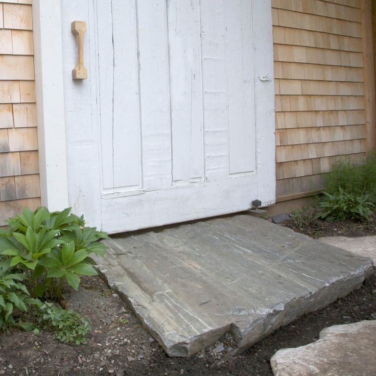 Application image for Mystic Mountain Natural - Steps &amp; Landings. The image shows this product being used for landings and monolithic steps. This is a building and landscape stone for outdoor residential applications. Suitable for general use, freeze-thaw conditions, high traffic areas, low slipperiness surfaces and high heel compatibilty situations. Higher to high on the price spectrum.