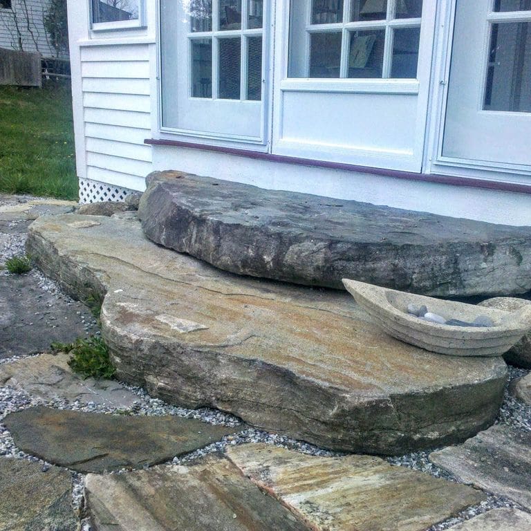 Application image for Mystic Mountain Natural - Steps &amp; Landings. The image shows this product being used for landings and monolithic steps. This is a building and landscape stone for outdoor residential applications. Suitable for general use, freeze-thaw conditions, high traffic areas, low slipperiness surfaces and high heel compatibilty situations. Higher to high on the price spectrum.