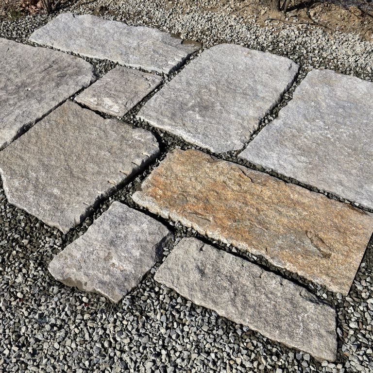 The image shows this product being used in a patio pavers application.