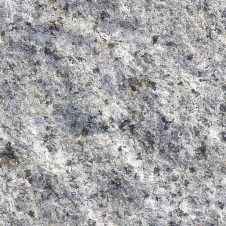 Color/Finish variation image for Reclaimed Granite Curbstone - Junior Wallstone. The dominant color shown is gray; with beige, blue, white and cream secondaries. Speckled, coarse speckled and blotched color patterns.