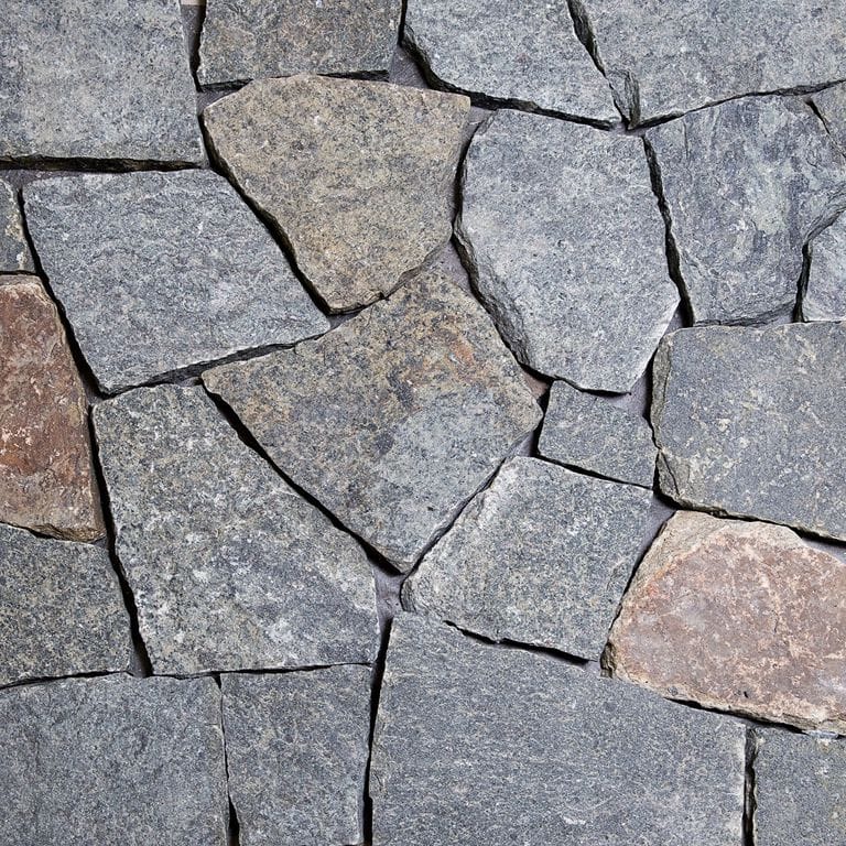 Color/Finish variation image for Blue Mountian Granite - Veneer. The surface finish shown is . Dominant colors shown are blue, gray and greige.