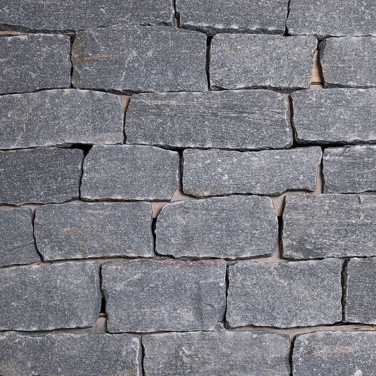 Color/Finish variation image for Heritage Granite - Veneer. The surface finish shown is split-face. The dominant color shown is gray.
