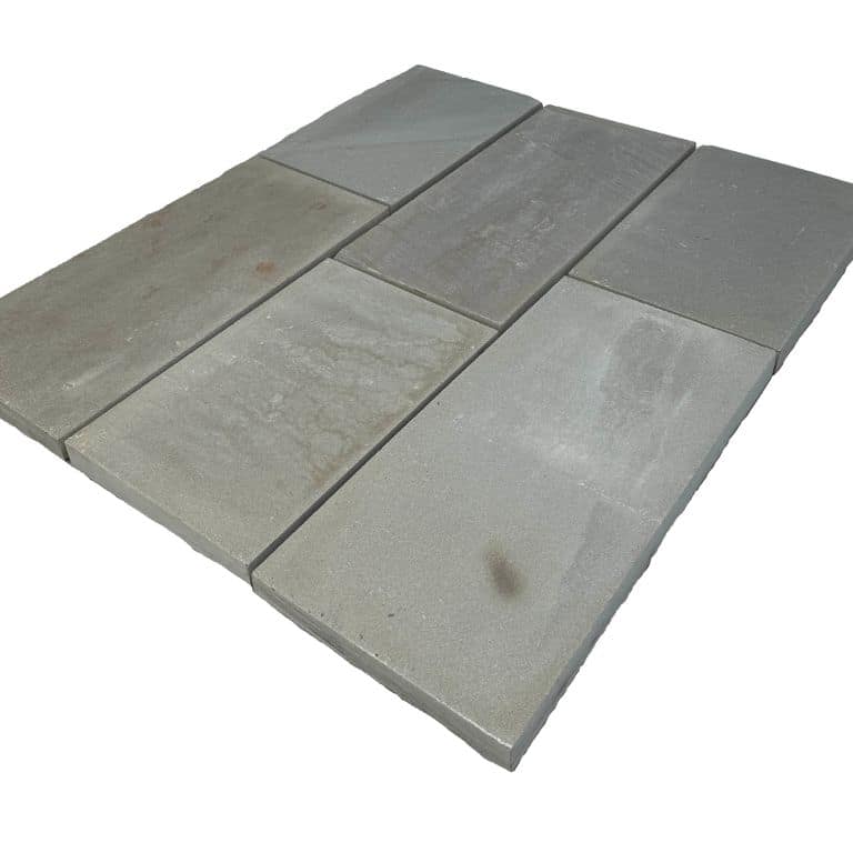 Oblique image for Bluestone - Full Color Dimensional Cut Pavers - Flamed. The surface finish shown is flamed. Dominant colors shown are blue, green and gray. The color mix creates a cool feeling.