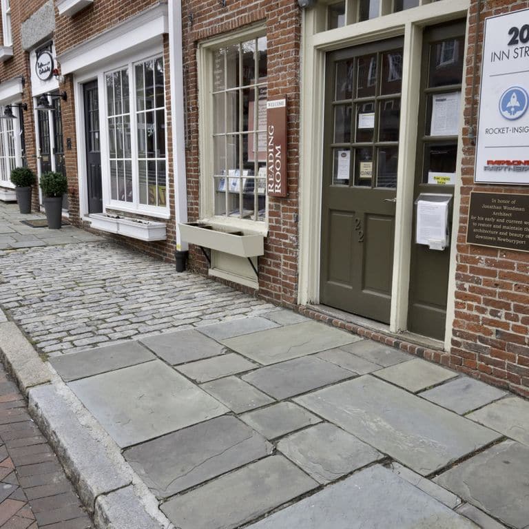 The image shows this product being used in a path pavers application.