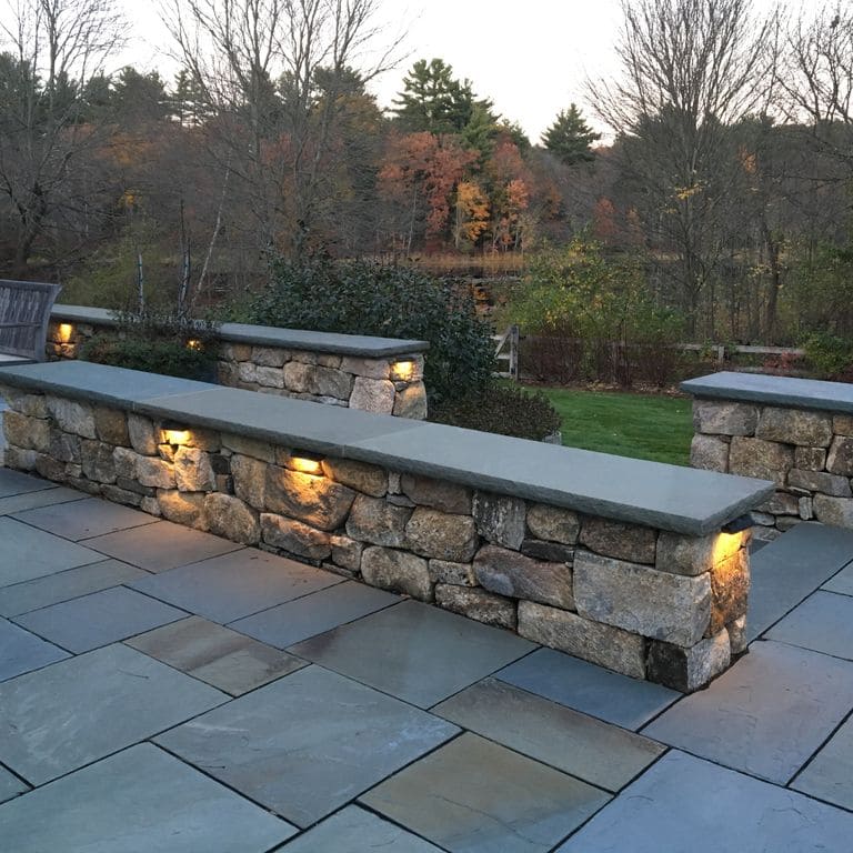 The image shows this product being used in a patio pavers application.