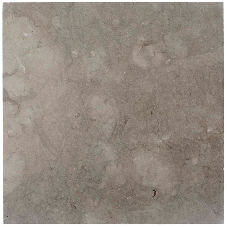 Swatch image cropped for Dawn Haze Limestone - Veneer. The surface finish shown is honed. Dominant colors shown are green, gray, purple and tan; with a brown secondary. Exhibits "movement". Random, blotched, swirled and cloudy color patterns.