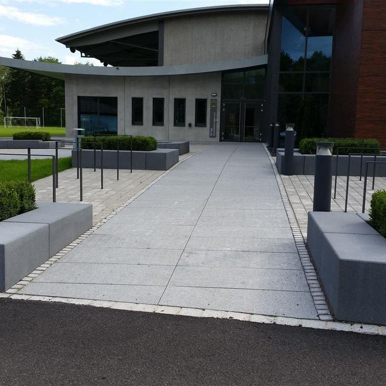 The image shows this product being used for Granite- Republic Black - Pavers.