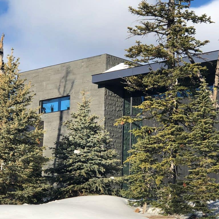 Application image for Basalt - Ankar Gray - Split Veneer. The image shows this product being used in a full bed veneer application. The surface finish shown is split-face. The dominant color shown is gray.