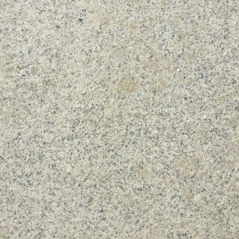 Color/Finish variation image for Cape Neddick Granite Clear - Dimensional Cut Pavers. Dominant colors shown are beige and gray; with green, white, tan and cream secondaries. The color mix creates a warm feeling. Fine speckled color pattern.